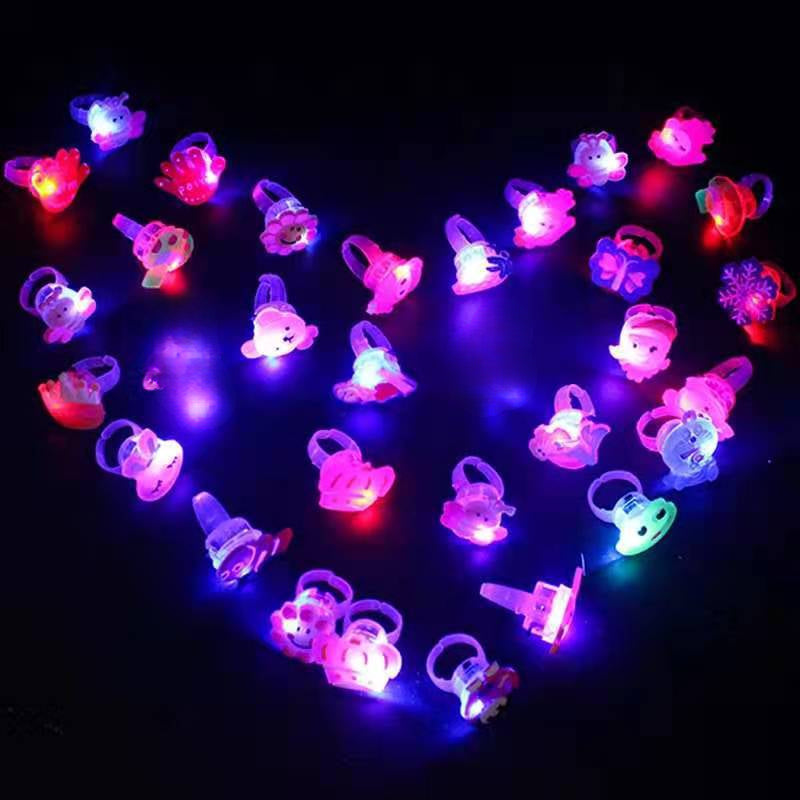 Anillos de juguetes luminosos de dibujos animados creativos para niños de 10 piezas al por mayor